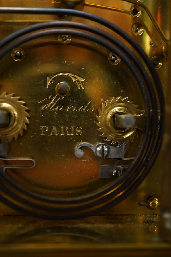 A French brass repeating carriage clock, engraved Paris to the backplate, 15cm high. Condition - good.